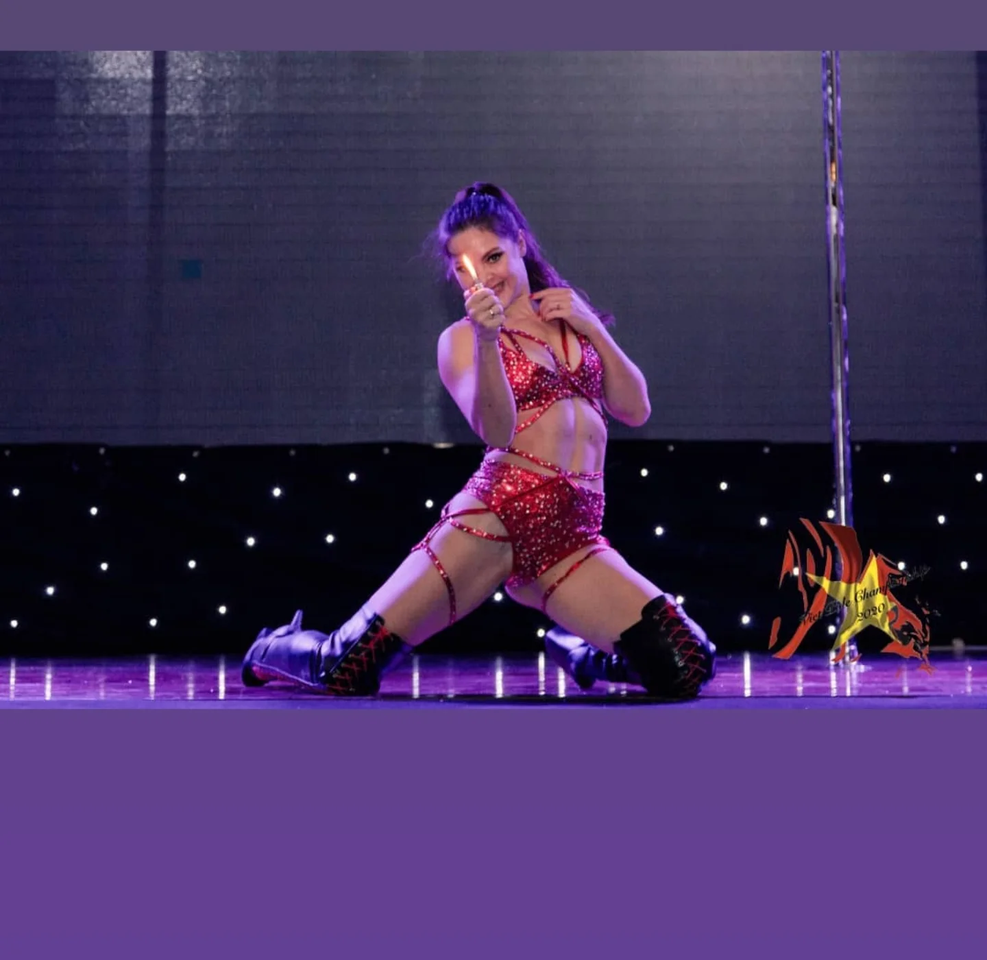 Instagram story from the Viet Pole Championship 2020, a competitor performing on stage in a red costume.